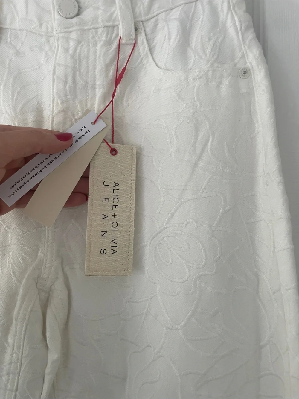 Alice + Olivia White Eyelet Jeans with Red Stitch Accents - Picture 8 of 14